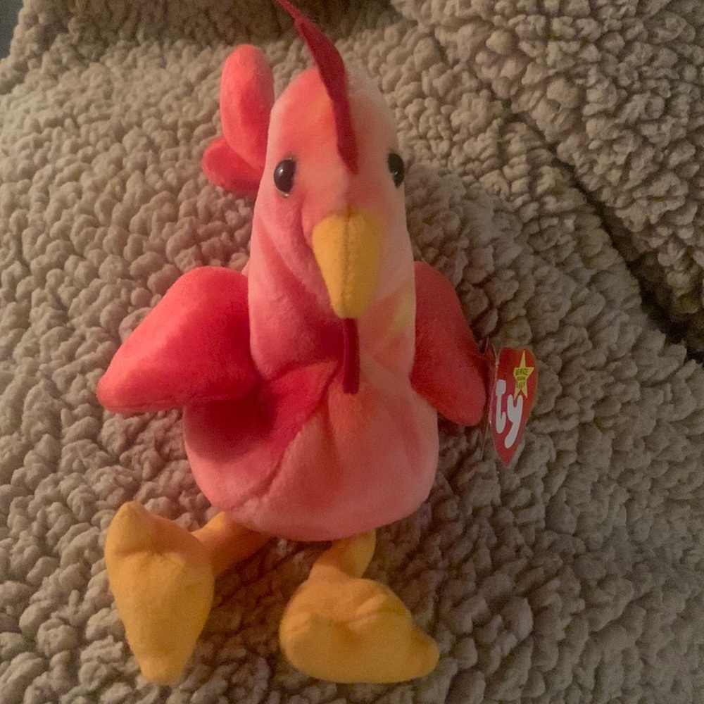 Beanie Baby Strut the rooster.  Flaw on seam
